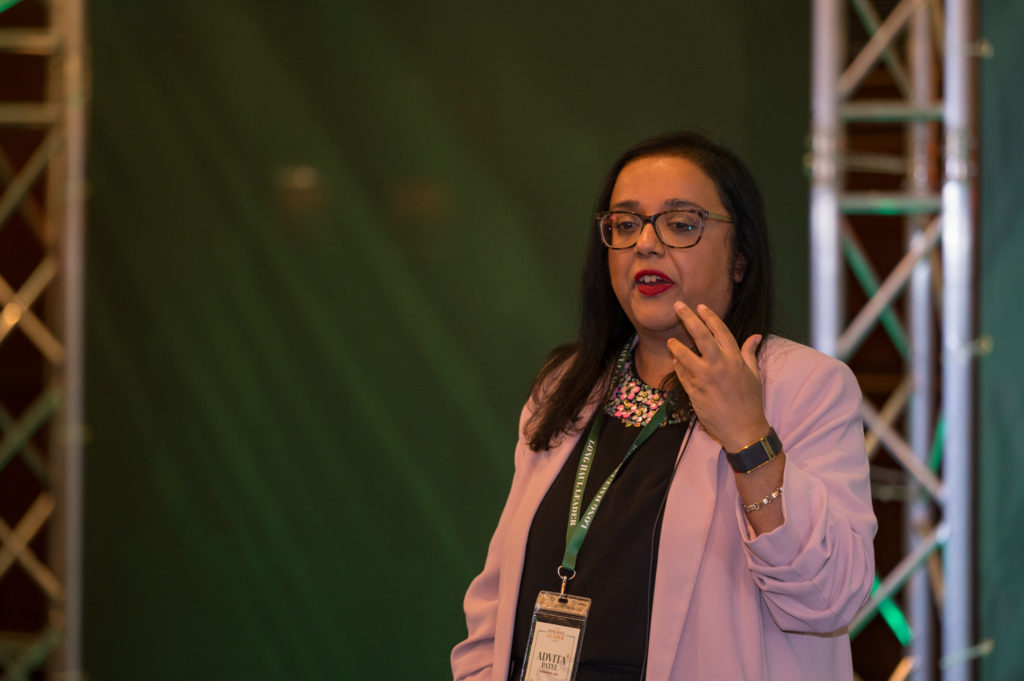 Advita on stage helping the audience understand what psychological safety means